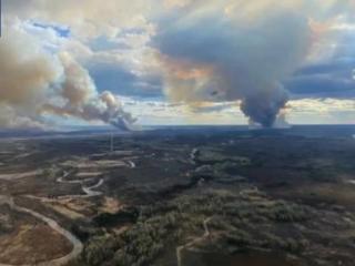 加拿大西部山火火情缓解 仍有大批民众撤离