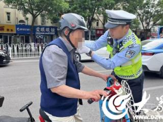 济宁市中交警持续开展骑乘电动自行车不佩戴安全头盔专项整治