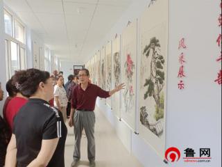 德州天衢新区长河街道明德社区开展“同心迎国庆 奋进新征程”书画展活动