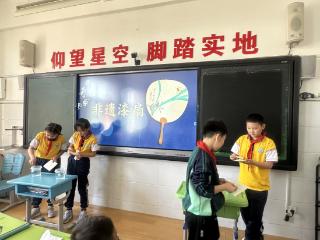 执扇绘风华，非遗润童心——智源小学开展“漆扇”非遗技艺实践活动