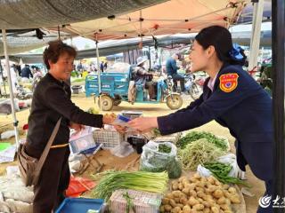 赶大集送知识！日照银行河山支行开展反诈金融宣传活动