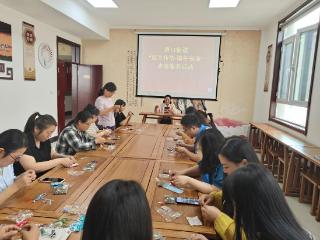 唐口社区网格开展“粽香传情 端午安康”志愿服务活动