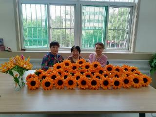 济宁市任城区济阳大街社区：巧手传祝福，向日葵扭扭花助考生“一举夺魁”