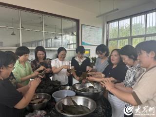 “粽叶飘香 情满端午” ——潍坊市牟山水库党总支开展端午节包粽子活动